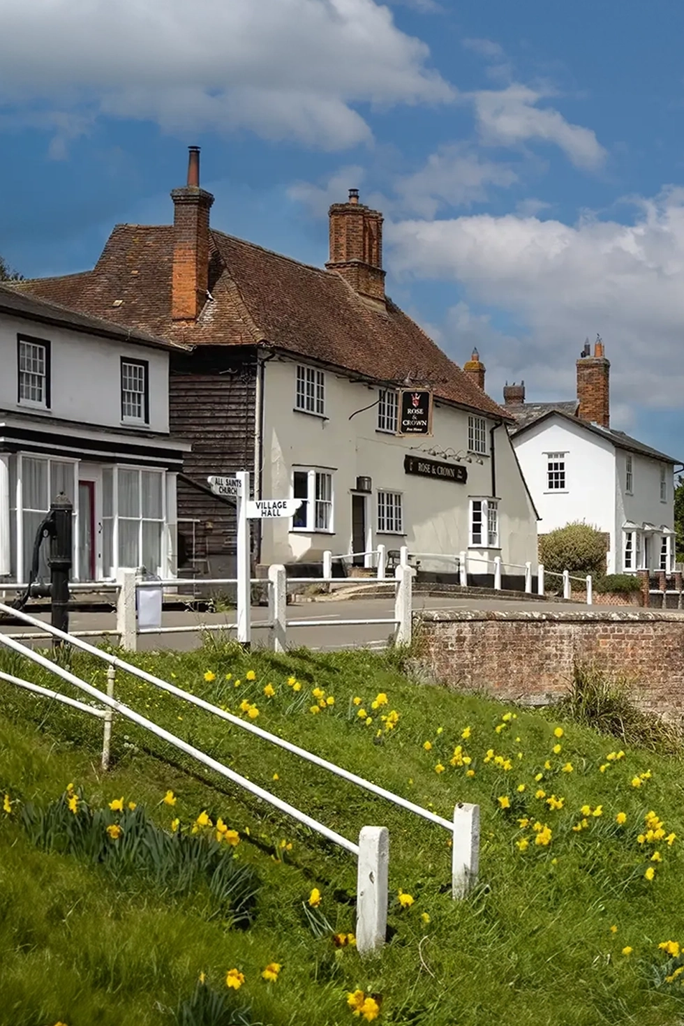 The-Rose-Crown-in-Ashdon-New-Daffodils The Rose & Crown pub in Ashdon with spring daffodils