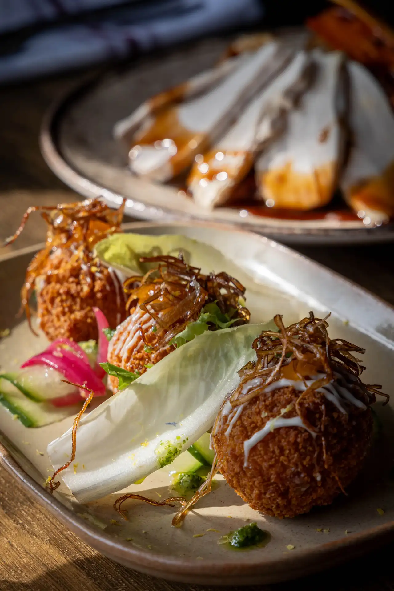Smoked haddock & spring onion croquettes Smoked haddock & spring onion croquettes with lemon mayo, pickled radish, chicory and crispy garnish